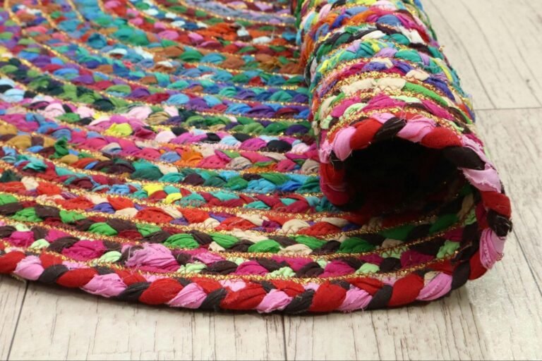 Colorful handwoven rug with layered textures and vibrant tones in a maximalist interior style